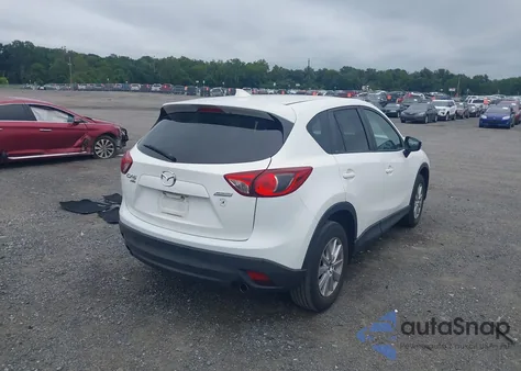 2016 Mazda Cx-5 Touring z USA, uszkodzony, nr VIN JM3KE4CY4G0902879
